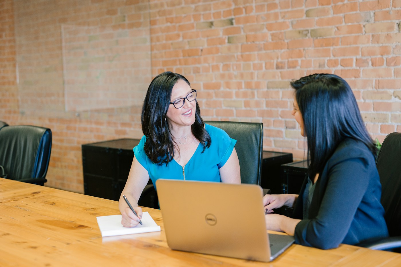 Customer success and product managers collaborating with real-time AI analytics and conversational tools